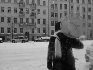 Woman with Fan - despite - 20 &deg; C
Stockholm Sweden - February 2010